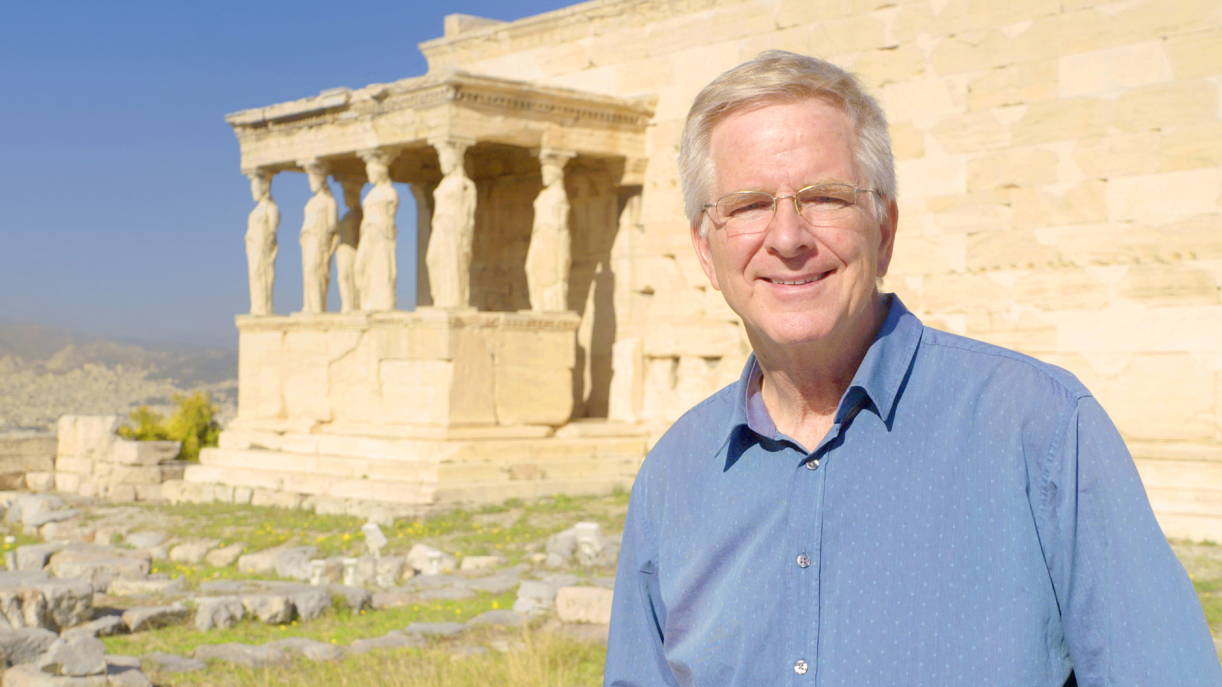Rick Steves and the Caryatids of Erechtheion, at the Acropolis in Athens, Greece.